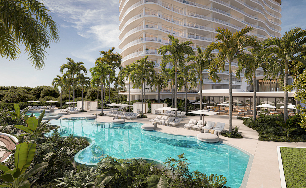 Resort-style pool with tropical gardens and tower facade