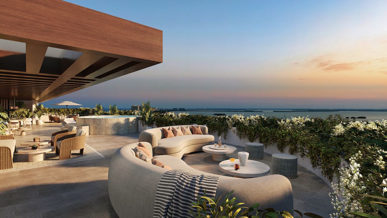 Rooftop lounge with infinity pool and Caribbean sunset panorama